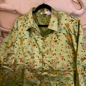 Plus size woman Asian touch blouse with  black headband.